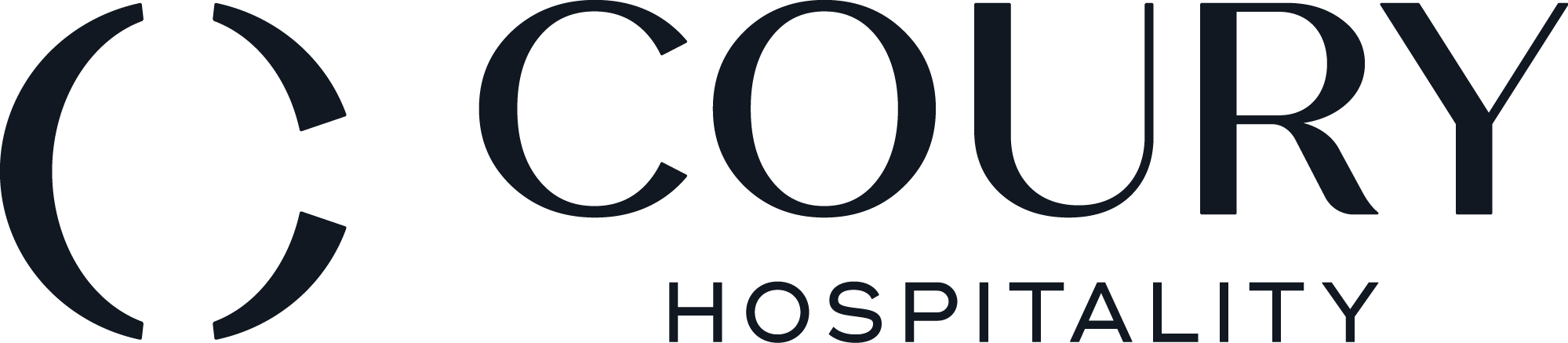 The image shows the logo of "Coury Hospitality," featuring stylized text with a semicircular design element.